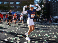 Runners trudge up First Avenue at Mile 16 of the New York City Marathon in New York City, United States, on November 3, 2024. (