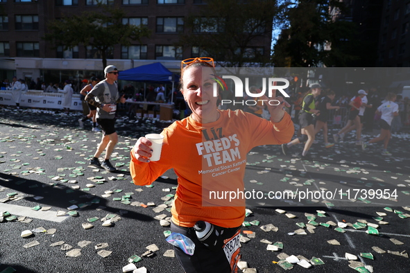 Runners trudge up First Avenue at Mile 16 of the New York City Marathon in New York City, United States, on November 3, 2024. 