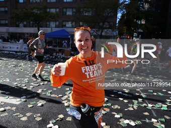 Runners trudge up First Avenue at Mile 16 of the New York City Marathon in New York City, United States, on November 3, 2024. (