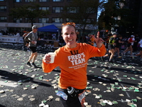 Runners trudge up First Avenue at Mile 16 of the New York City Marathon in New York City, United States, on November 3, 2024. (