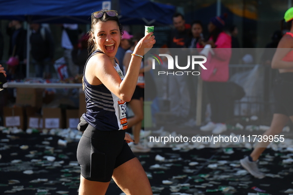 Runners trudge up First Avenue at Mile 16 of the New York City Marathon in New York City, United States, on November 3, 2024. 