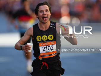 Runner Ryan Bjellquist Ledger of the United States heads up First Avenue during the 2024 New York City Marathon in New York, N.Y., on Novemb...