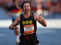 Runner Ryan Bjellquist Ledger of the United States heads up First Avenue during the 2024 New York City Marathon in New York, N.Y., on Novemb...