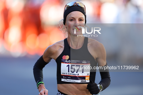 Marathoner Shalene Flanagan of the United States races up First Avenue during the New York City Marathon in New York, N.Y., on November 3, 2...