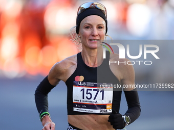 Marathoner Shalene Flanagan of the United States races up First Avenue during the New York City Marathon in New York, N.Y., on November 3, 2...