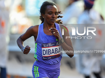 Marathoner Tirunesh Dibaba of Ethiopia races up First Avenue during the 2024 New York City Marathon in New York, N.Y., on November 3, 2024....