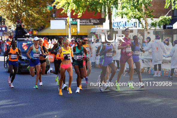 The women leaders head up First Avenue at mile 16 during the 2024 New York City Marathon in New York, N.Y., on November 3, 2024. 