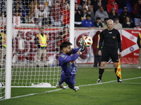 New York Red Bulls goalkeeper Carlos Coronel makes a penalty kick save to eliminate the defending MLS Cup champion Columbus Crew in Harris,...