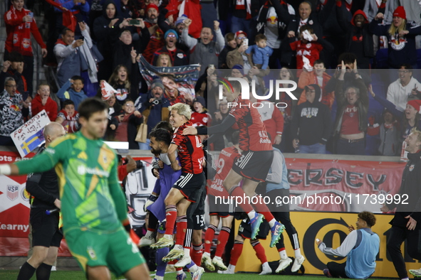 New York Red Bulls goalkeeper Carlos Coronel celebrates victory in Harris, New Jersey, on November 3, 2024. The dramatic shootout turns into...