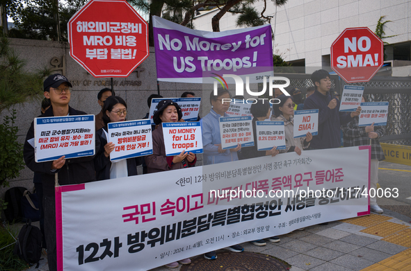 Members of the group People for Peace and Reunification hold a protest in front of the Ministry of Foreign Affairs, opposing the Special Mea...