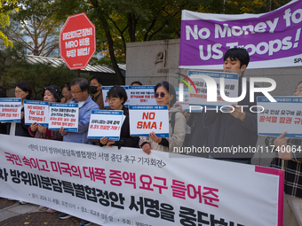 Members of the group People for Peace and Reunification hold a protest in front of the Ministry of Foreign Affairs, opposing the Special Mea...