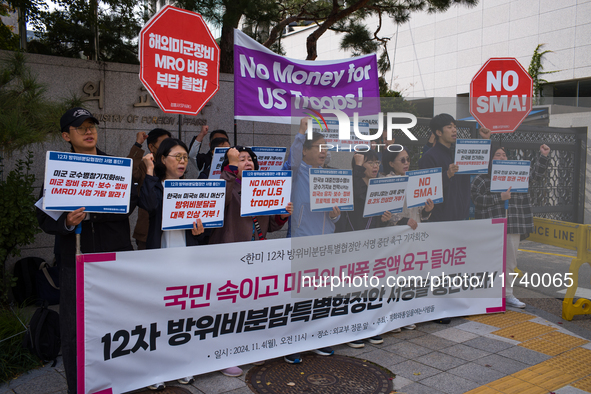 Members of the group People for Peace and Reunification hold a protest in front of the Ministry of Foreign Affairs, opposing the Special Mea...