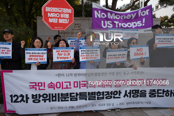 Members of the group People for Peace and Reunification hold a protest in front of the Ministry of Foreign Affairs, opposing the Special Mea...