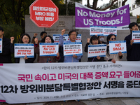 Members of the group People for Peace and Reunification hold a protest in front of the Ministry of Foreign Affairs, opposing the Special Mea...