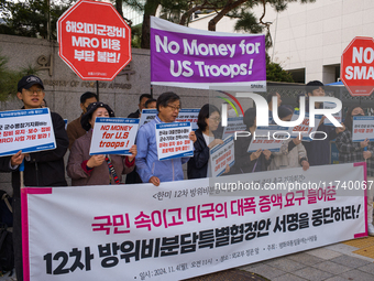 Members of the group People for Peace and Reunification hold a protest in front of the Ministry of Foreign Affairs, opposing the Special Mea...