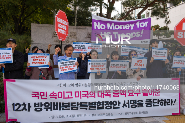 Members of the group People for Peace and Reunification hold a protest in front of the Ministry of Foreign Affairs, opposing the Special Mea...