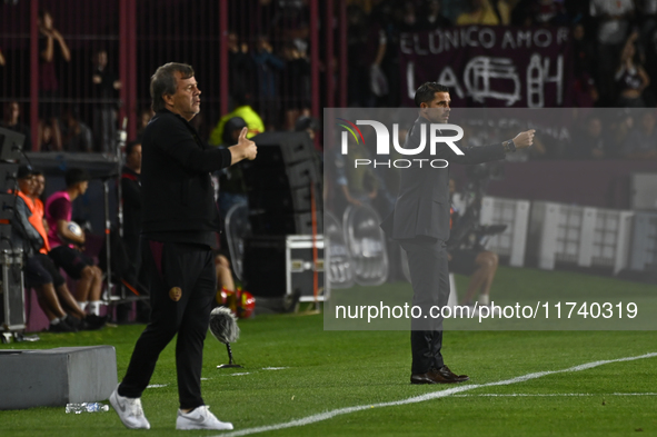 Fernando Gago and Ricardo Zielinski, coaches of Boca Jrs and Lanus, give instructions to their team players during a Liga Profesional 2024 m...