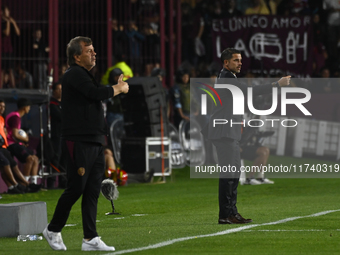 Fernando Gago and Ricardo Zielinski, coaches of Boca Jrs and Lanus, give instructions to their team players during a Liga Profesional 2024 m...