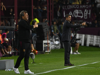 Fernando Gago and Ricardo Zielinski, coaches of Boca Jrs and Lanus, give instructions to their team players during a Liga Profesional 2024 m...