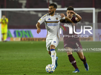 Marcelo Saracchi of Boca Jrs competes for the ball against Felipe Pena Biafore of Lanus during a Liga Profesional 2024 match between Lanus a...