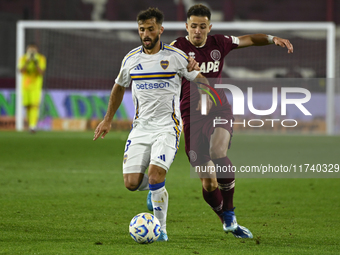 Marcelo Saracchi of Boca Jrs competes for the ball against Felipe Pena Biafore of Lanus during a Liga Profesional 2024 match between Lanus a...