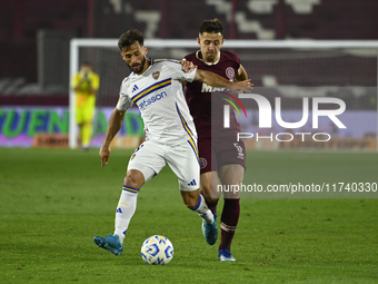 Marcelo Saracchi of Boca Jrs competes for the ball against Felipe Pena Biafore of Lanus during a Liga Profesional 2024 match between Lanus a...