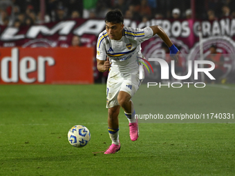 Exequiel Zeballos of Boca Jrs drives the ball during a Liga Profesional 2024 match between Lanus and Boca Jrs at Estadio Ciudad de Lanus in...