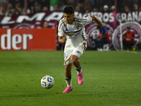 Exequiel Zeballos of Boca Jrs drives the ball during a Liga Profesional 2024 match between Lanus and Boca Jrs at Estadio Ciudad de Lanus in...