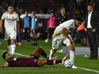 Joquin Ruiz of Boca Jrs competes for the ball against Eduardo Salvio of Lanus during a Liga Profesional 2024 match between Lanus and Boca Jr...