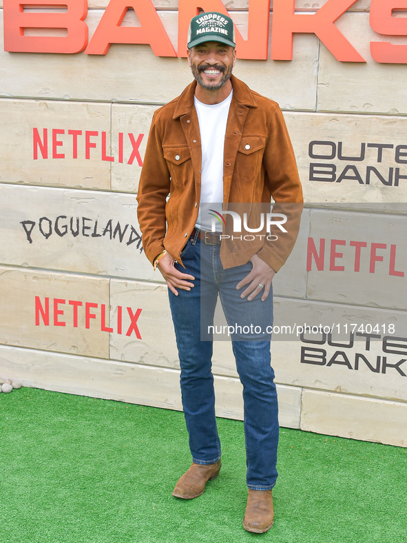 Marland Burke arrives at Netflix's Poguelandia 2024 Event Celebrating 'Outer Banks' Season 4 Part 2 held at Barker Hangar on November 2, 202...