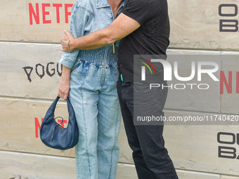 Brianna Brown and Tony Crane arrive at Netflix's Poguelandia 2024 Event Celebrating 'Outer Banks' Season 4 Part 2 held at Barker Hangar on N...