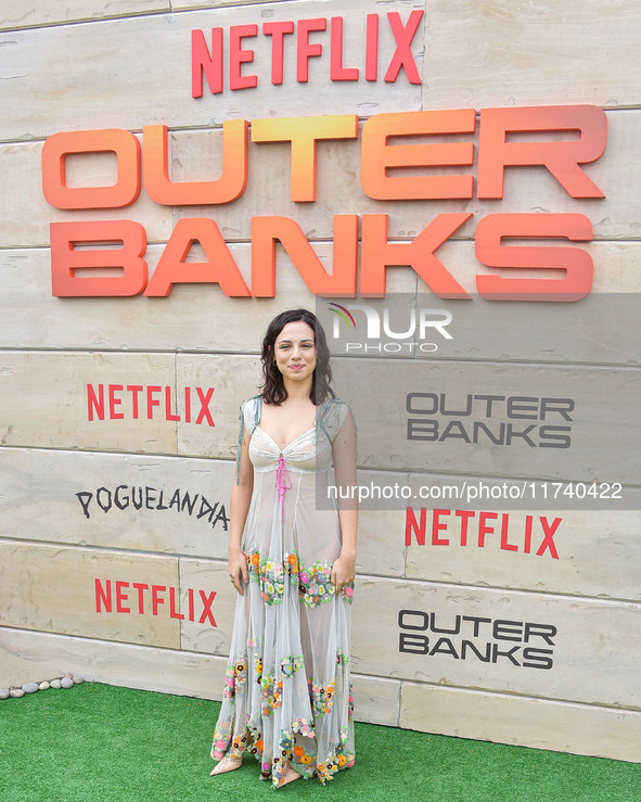 Fiona Palomo arrives at Netflix's Poguelandia 2024 Event Celebrating 'Outer Banks' Season 4 Part 2 held at Barker Hangar on November 2, 2024...