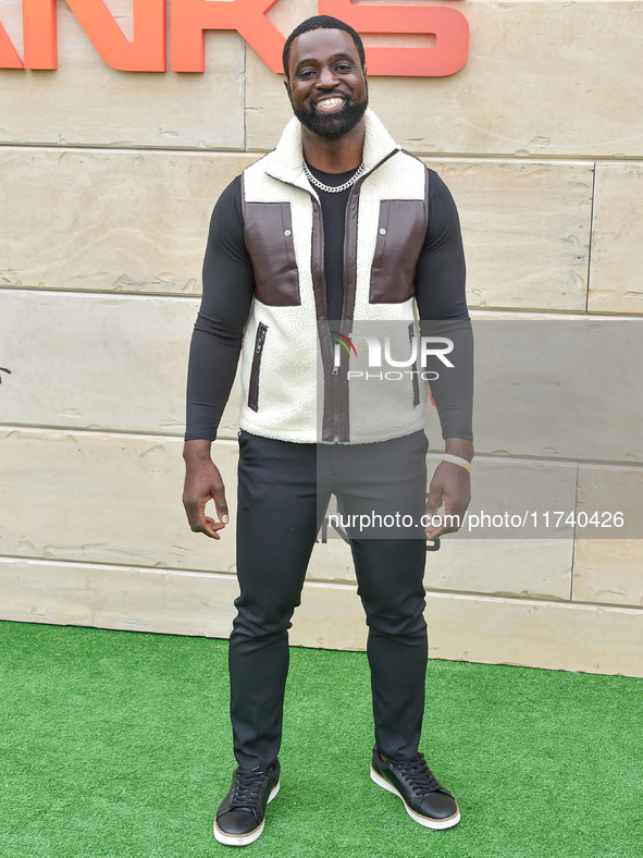 Philip Fornah arrives at Netflix's Poguelandia 2024 Event Celebrating 'Outer Banks' Season 4 Part 2 held at Barker Hangar on November 2, 202...