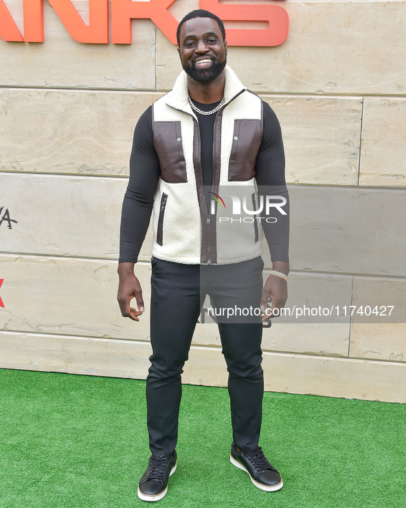 Philip Fornah arrives at Netflix's Poguelandia 2024 Event Celebrating 'Outer Banks' Season 4 Part 2 held at Barker Hangar on November 2, 202...