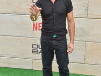 Tony Crane arrives at Netflix's Poguelandia 2024 Event Celebrating 'Outer Banks' Season 4 Part 2 held at Barker Hangar on November 2, 2024 i...