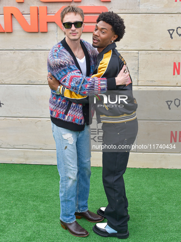 Drew Starkey and Jonathan Daviss arrive at Netflix's Poguelandia 2024 Event Celebrating 'Outer Banks' Season 4 Part 2 held at Barker Hangar...