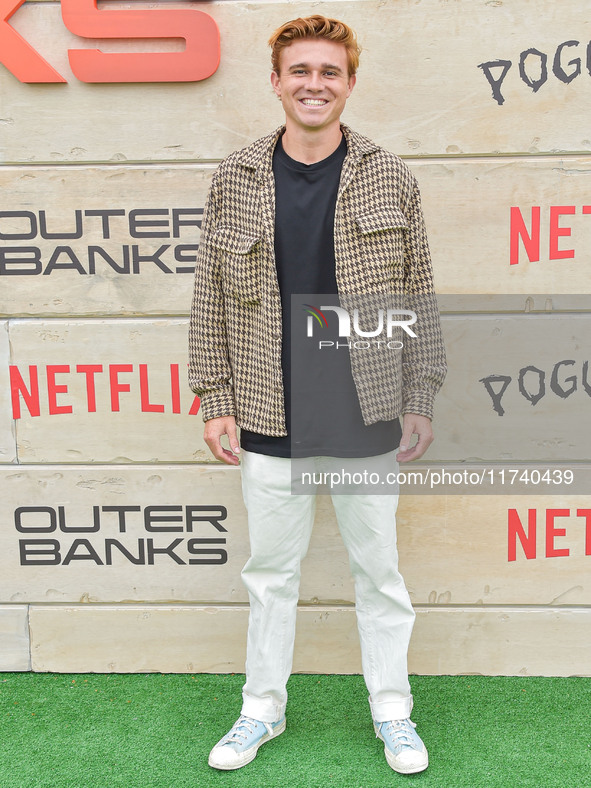 Kaz Sawyer arrives at Netflix's Poguelandia 2024 Event Celebrating 'Outer Banks' Season 4 Part 2 held at Barker Hangar on November 2, 2024 i...