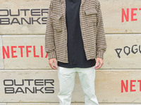 Kaz Sawyer arrives at Netflix's Poguelandia 2024 Event Celebrating 'Outer Banks' Season 4 Part 2 held at Barker Hangar on November 2, 2024 i...