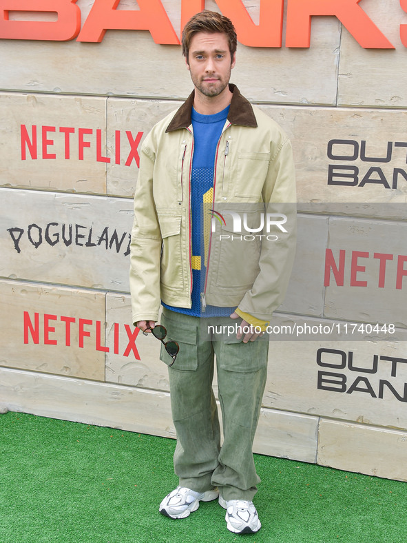 Austin North arrives at Netflix's Poguelandia 2024 Event Celebrating 'Outer Banks' Season 4 Part 2 held at Barker Hangar on November 2, 2024...