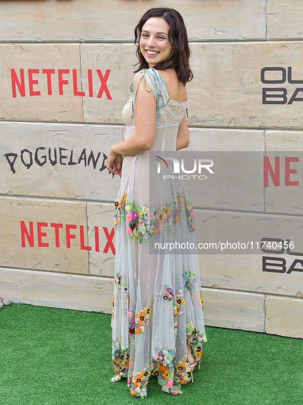 Fiona Palomo arrives at Netflix's Poguelandia 2024 Event Celebrating 'Outer Banks' Season 4 Part 2 held at Barker Hangar on November 2, 2024...