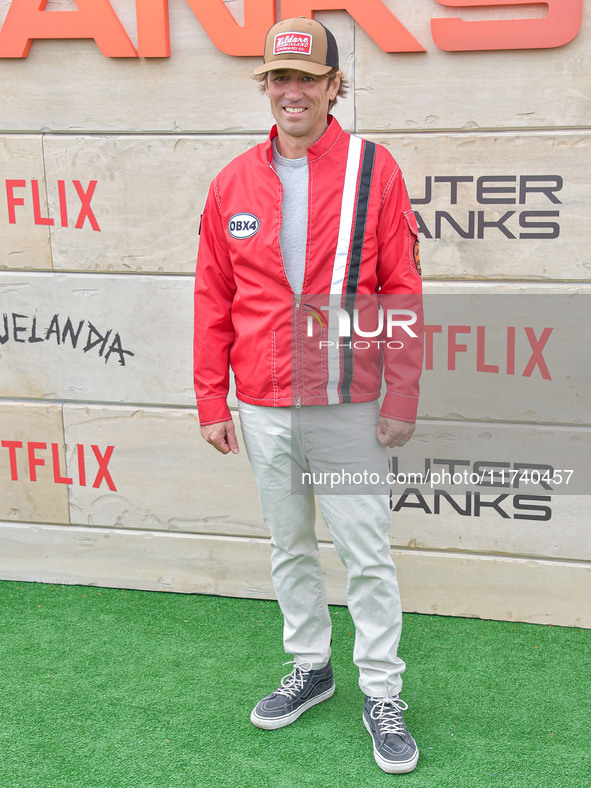 Jonas Pate arrives at Netflix's Poguelandia 2024 Event Celebrating 'Outer Banks' Season 4 Part 2 held at Barker Hangar on November 2, 2024 i...