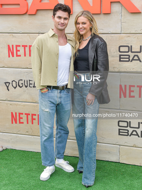 Chase Stokes and girlfriend Kelsea Ballerini arrive at Netflix's Poguelandia 2024 Event Celebrating 'Outer Banks' Season 4 Part 2 held at Ba...