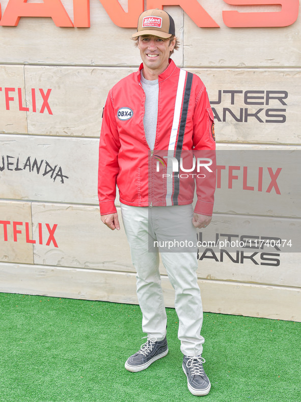 Jonas Pate arrives at Netflix's Poguelandia 2024 Event Celebrating 'Outer Banks' Season 4 Part 2 held at Barker Hangar on November 2, 2024 i...