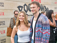 Madelyn Cline and Drew Starkey arrive at Netflix's Poguelandia 2024 Event Celebrating 'Outer Banks' Season 4 Part 2 held at Barker Hangar on...