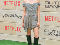 Mia Challis arrives at Netflix's Poguelandia 2024 Event Celebrating 'Outer Banks' Season 4 Part 2 held at Barker Hangar on November 2, 2024...