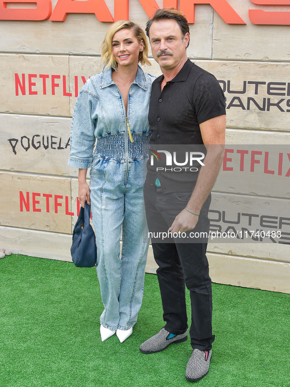 Brianna Brown and Tony Crane arrive at Netflix's Poguelandia 2024 Event Celebrating 'Outer Banks' Season 4 Part 2 held at Barker Hangar on N...