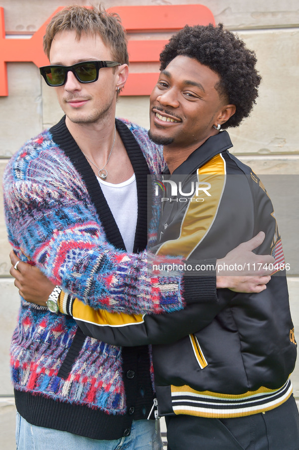 Drew Starkey and Jonathan Daviss arrive at Netflix's Poguelandia 2024 Event Celebrating 'Outer Banks' Season 4 Part 2 held at Barker Hangar...