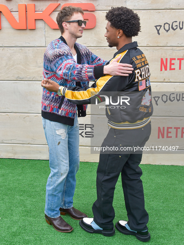 Drew Starkey and Jonathan Daviss arrive at Netflix's Poguelandia 2024 Event Celebrating 'Outer Banks' Season 4 Part 2 held at Barker Hangar...