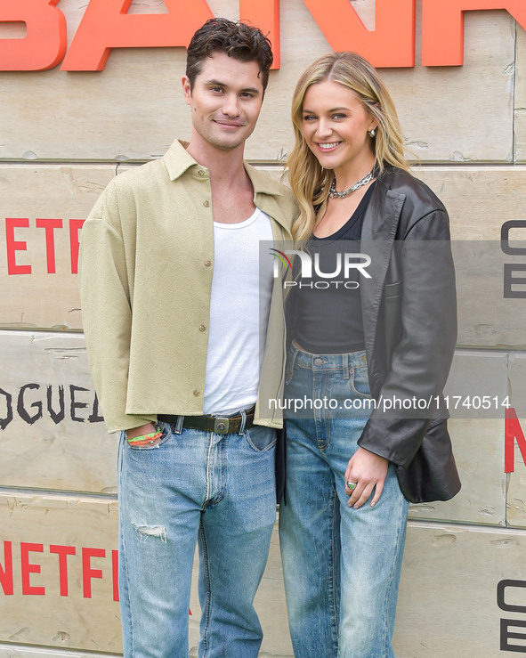 Chase Stokes and girlfriend Kelsea Ballerini arrive at Netflix's Poguelandia 2024 Event Celebrating 'Outer Banks' Season 4 Part 2 held at Ba...