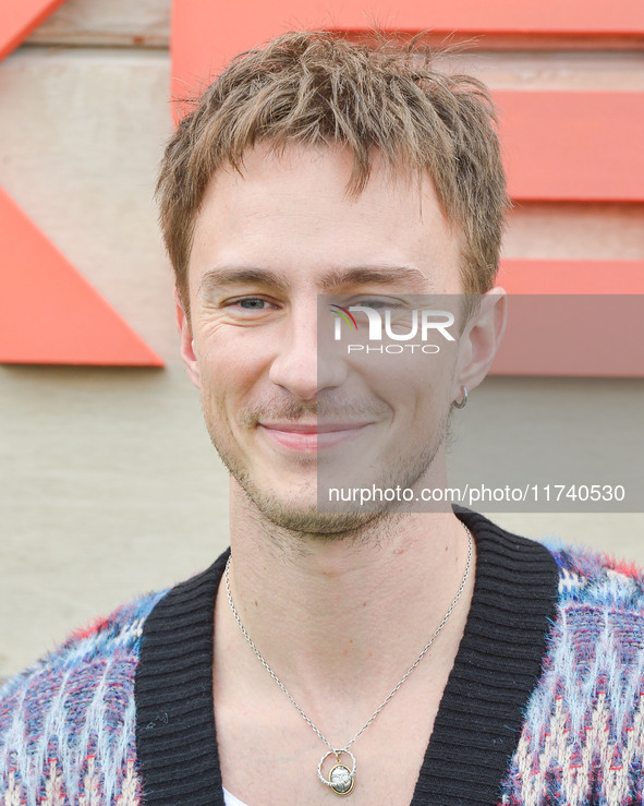 Drew Starkey arrives at Netflix's Poguelandia 2024 Event Celebrating 'Outer Banks' Season 4 Part 2 held at Barker Hangar on November 2, 2024...